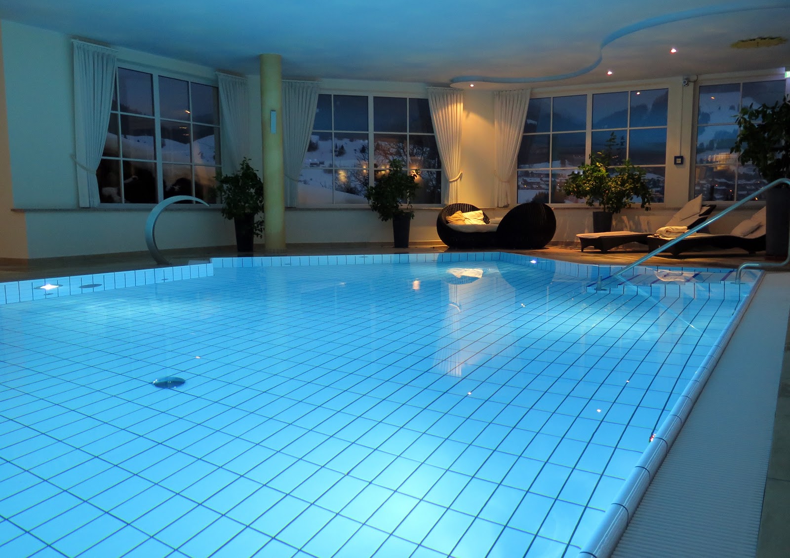 Dimly lit custom indoor swimming pool
