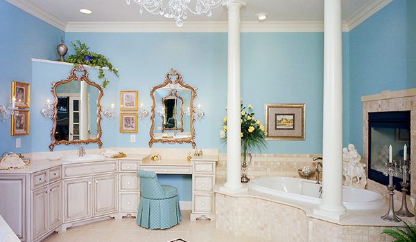 Spacious blue and white accent master bathroom