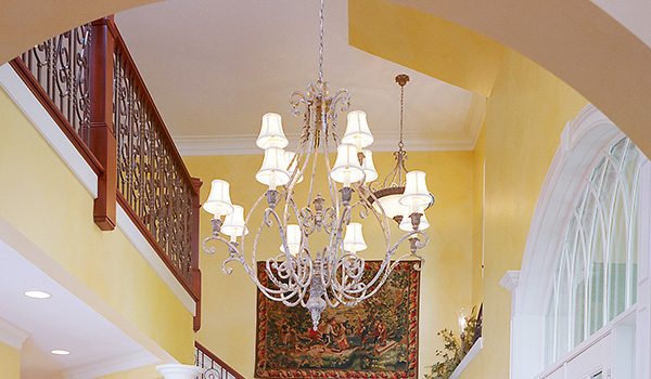 Entry way chandelier in a Michael and Associates custom home