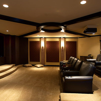 Movie playing on large downstairs entertainment center theater
