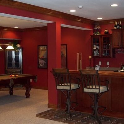 Michael and associates custom home basement with bar and pool room