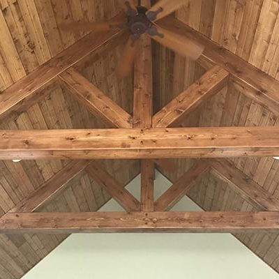 Michael and associates custom home ceiling feature with large wooden beams