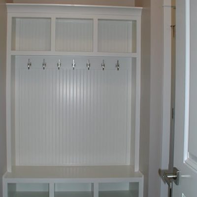 White custom coat rack with shoe storage
