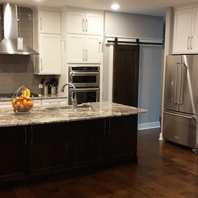 Michael and associates spacious kitchen with hardwood floors