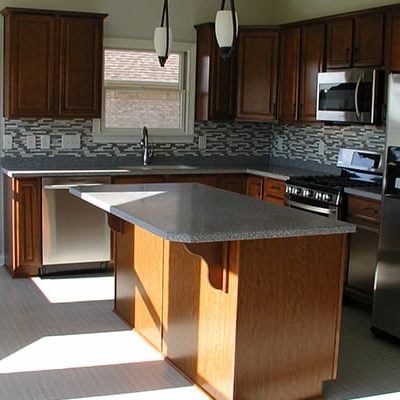Michael and associates custom kitchen with stainless appliances