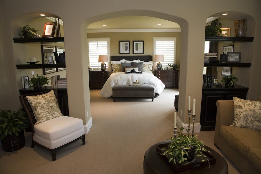 Multi-generational custom home design includes first floor master suites.