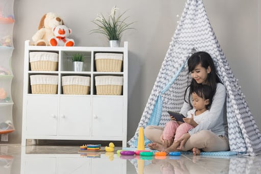 Mother and child in custom kids organized room