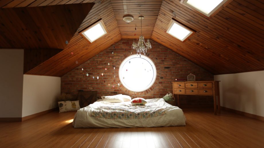 upstairs living space with bed